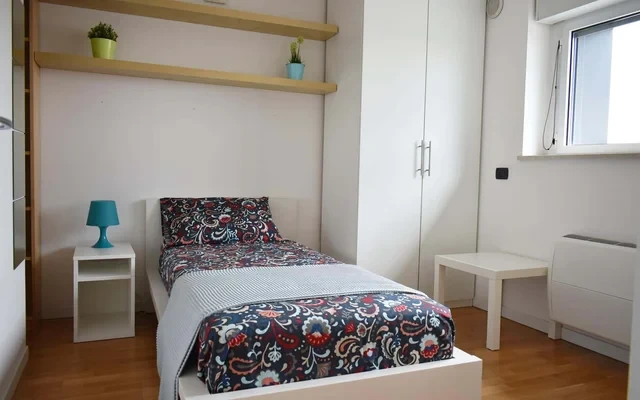 VIALE DELL'INNOVAZIONE 22 SC.6 P.12 B <br> SHARED ROOM D1 - Bed A 4