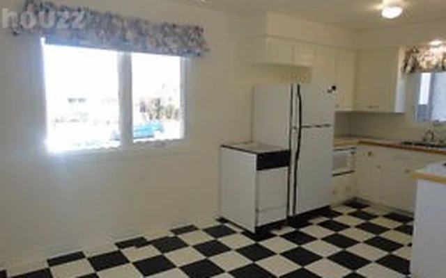 2 Bedrooms & Den House with Backyard Patios 0