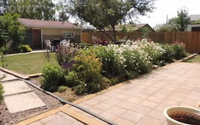 2 Bedrooms & Den House with Backyard Patios 1