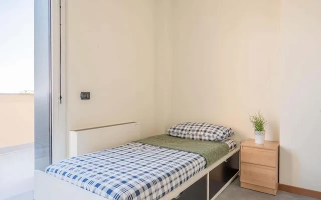 VIALE DELL'INNOVAZIONE 22 SC.5 P.6 <br> SHARED ROOM D1 - Bed A 2