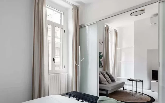 Elegante appartamento minimal dai tocchi botanici 3