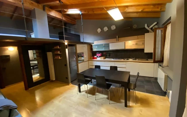 Elegant Open Space with Mezzanine and Terrace in Bergamo (BG) 1