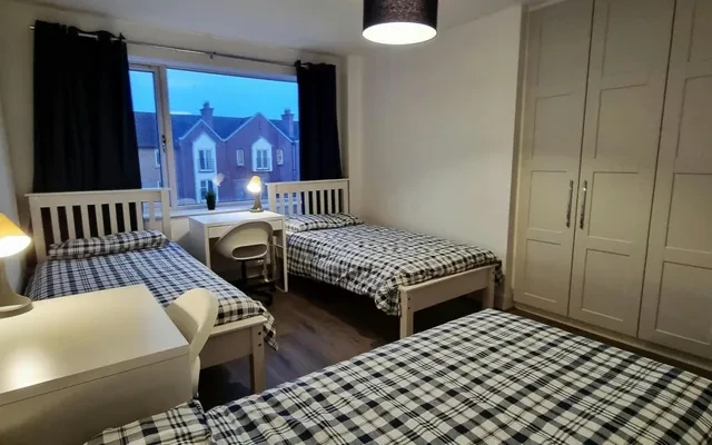 Bed in a comfy triple bedroom, in Grangegorman 1