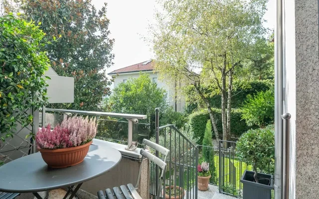 Quadrilocale con giardino vicino al centro 0