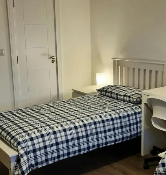 Bed in a comfy triple bedroom, in Grangegorman