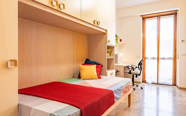 VIALE ENRICO MARTINI 9 <br> SHARED ROOM D1 - Bed A 1