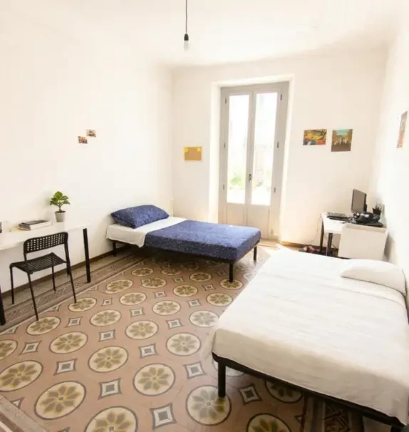 Bed in a big twin bedroom, near the Porta Garibaldi train station