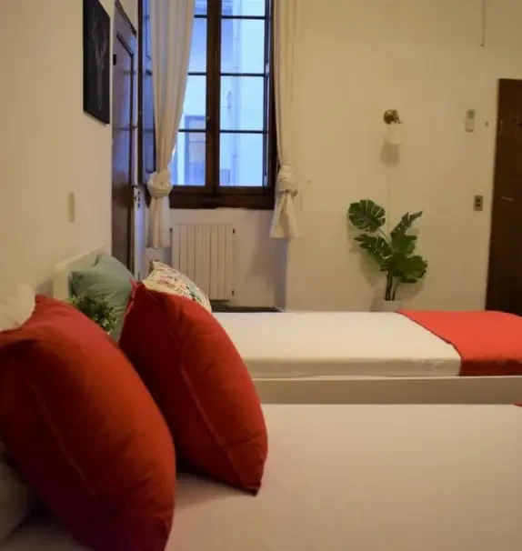 Bed in a neat twin ensuite bedroom, in Santa Maria Novella